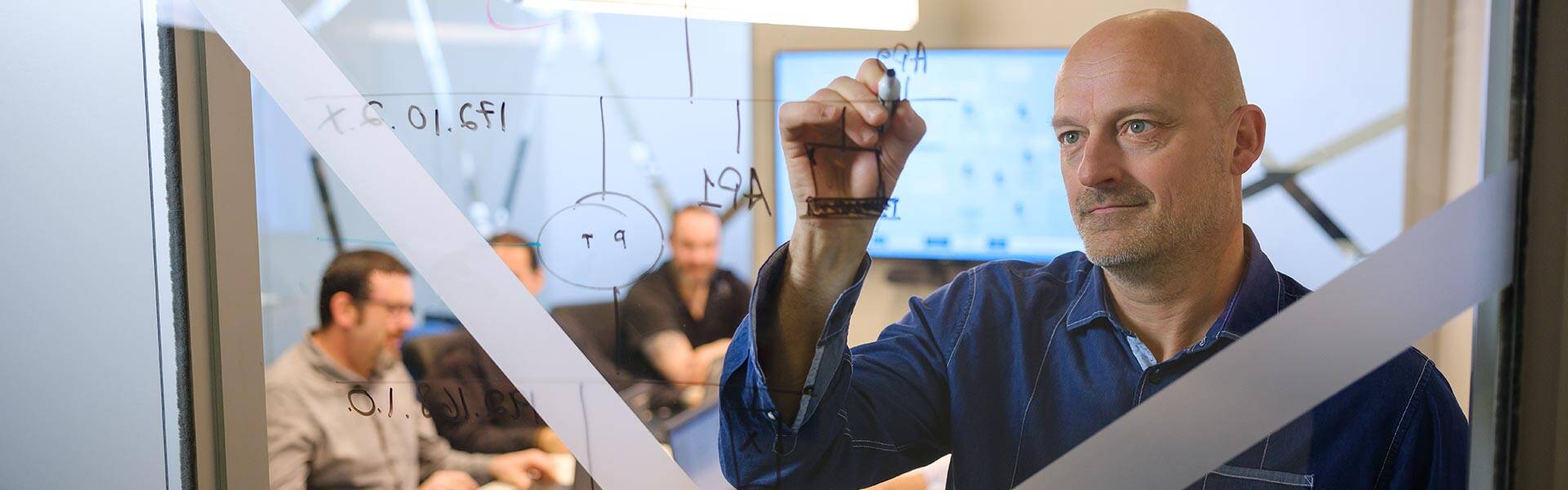Team member working in a meeting